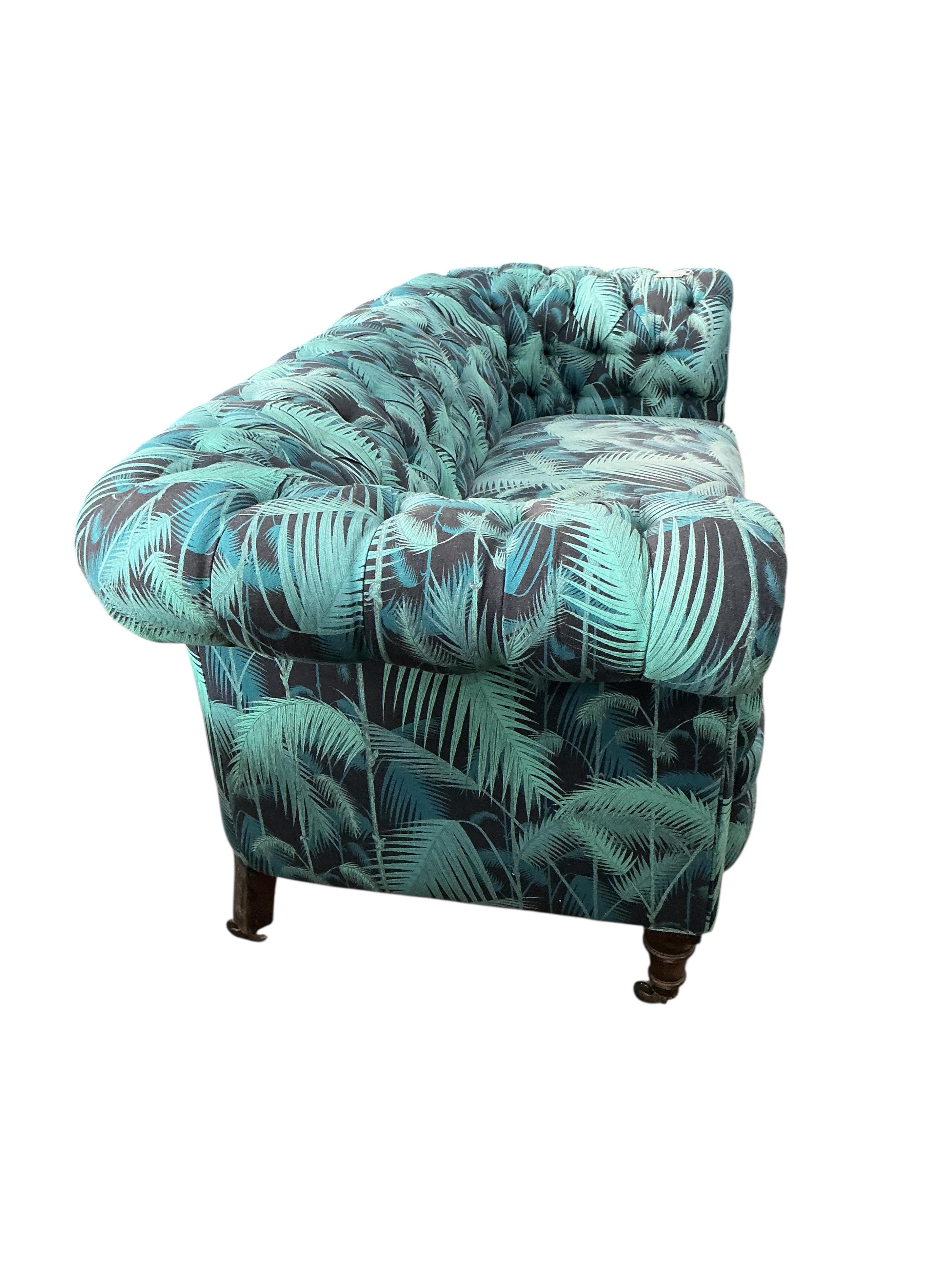 A late Victorian upholstered Chesterfield settee, width 190cm, depth 80cm, height 75cm